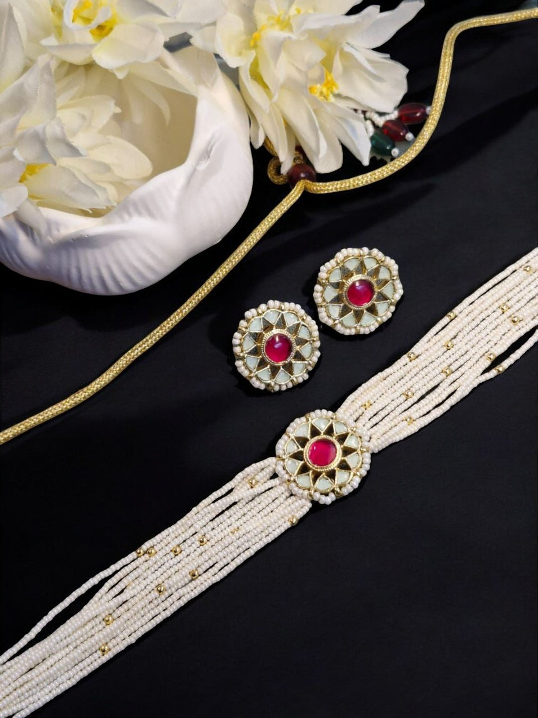 #HouseOfPranvi #NayraRubySet #KundanPearlChoker #RubyChokerDesign #IvoryPearlJewellery #TraditionalIndianJewels #HeritageInspired #StatementChoker #BridalJewellerySet #WeddingEditJewels #KundanEarringsSet #TimelessTreasure #EthnicLuxury #MinimalYetBold #IndianJewelleryLove