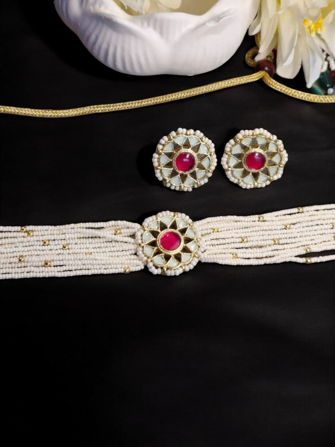 #HouseOfPranvi #NayraRubySet #KundanPearlChoker #RubyChokerDesign #IvoryPearlJewellery #TraditionalIndianJewels #HeritageInspired #StatementChoker #BridalJewellerySet #WeddingEditJewels #KundanEarringsSet #TimelessTreasure #EthnicLuxury #MinimalYetBold #IndianJewelleryLove