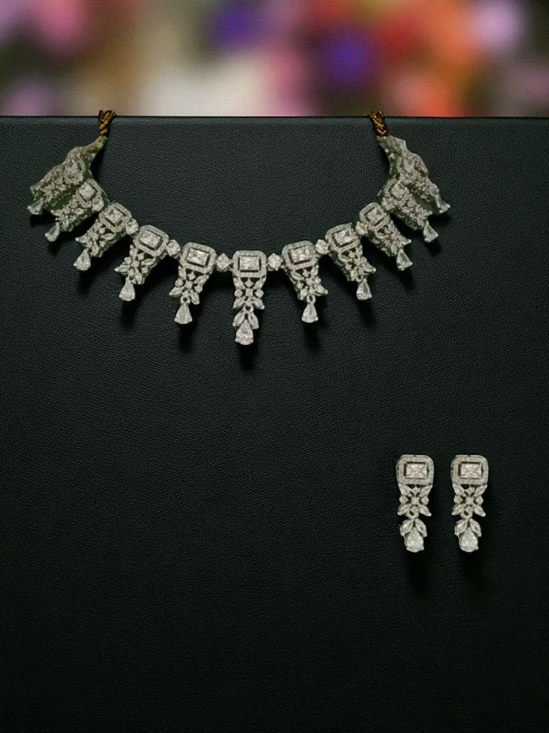 diamond choker necklace
bridal diamond necklace
luxury necklace set
statement diamond jewellery
wedding necklace for women
party wear choker set
house of pranvi necklace
exclusive jewellery set
sparkling necklace for bride
silver diamond finish necklace