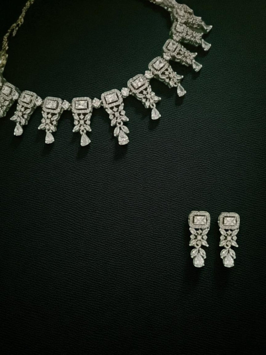 diamond choker necklace
bridal diamond necklace
luxury necklace set
statement diamond jewellery
wedding necklace for women
party wear choker set
house of pranvi necklace
exclusive jewellery set
sparkling necklace for bride
silver diamond finish necklace