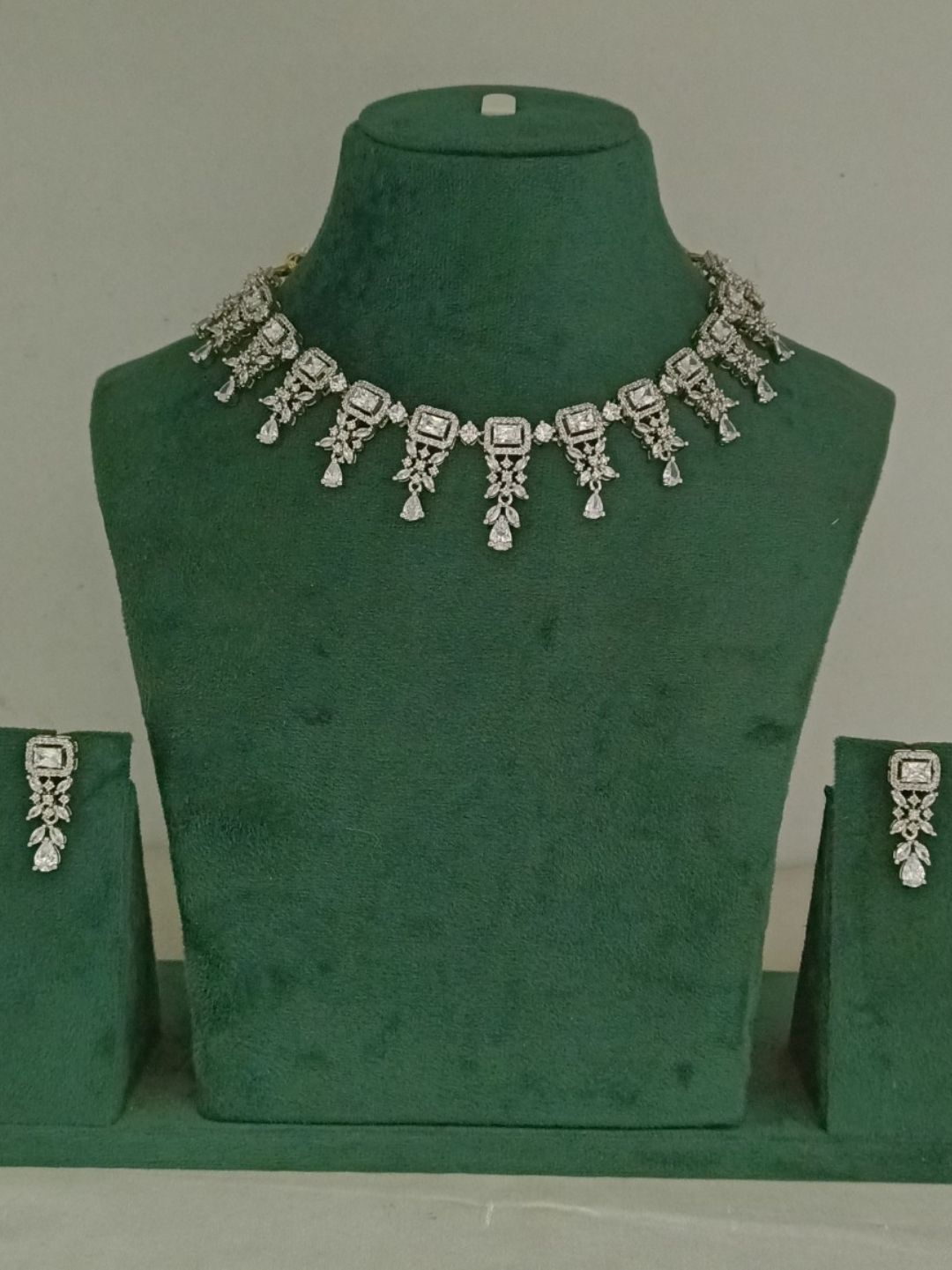 diamond choker necklace
bridal diamond necklace
luxury necklace set
statement diamond jewellery
wedding necklace for women
party wear choker set
house of pranvi necklace
exclusive jewellery set
sparkling necklace for bride
silver diamond finish necklace