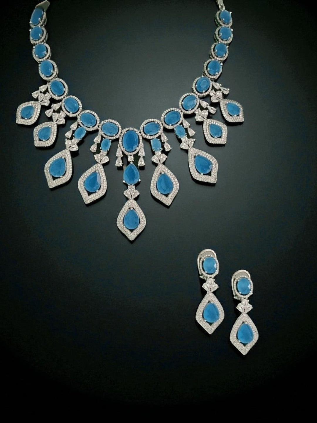 blue stone necklace set
statement jewellery for weddings
diamond finish necklace
house of pranvi jewellery
bridal blue necklace set
ocean blue jewellery set
party wear necklace for women
luxury necklace for occasions
designer necklace set
trendy necklace for receptions