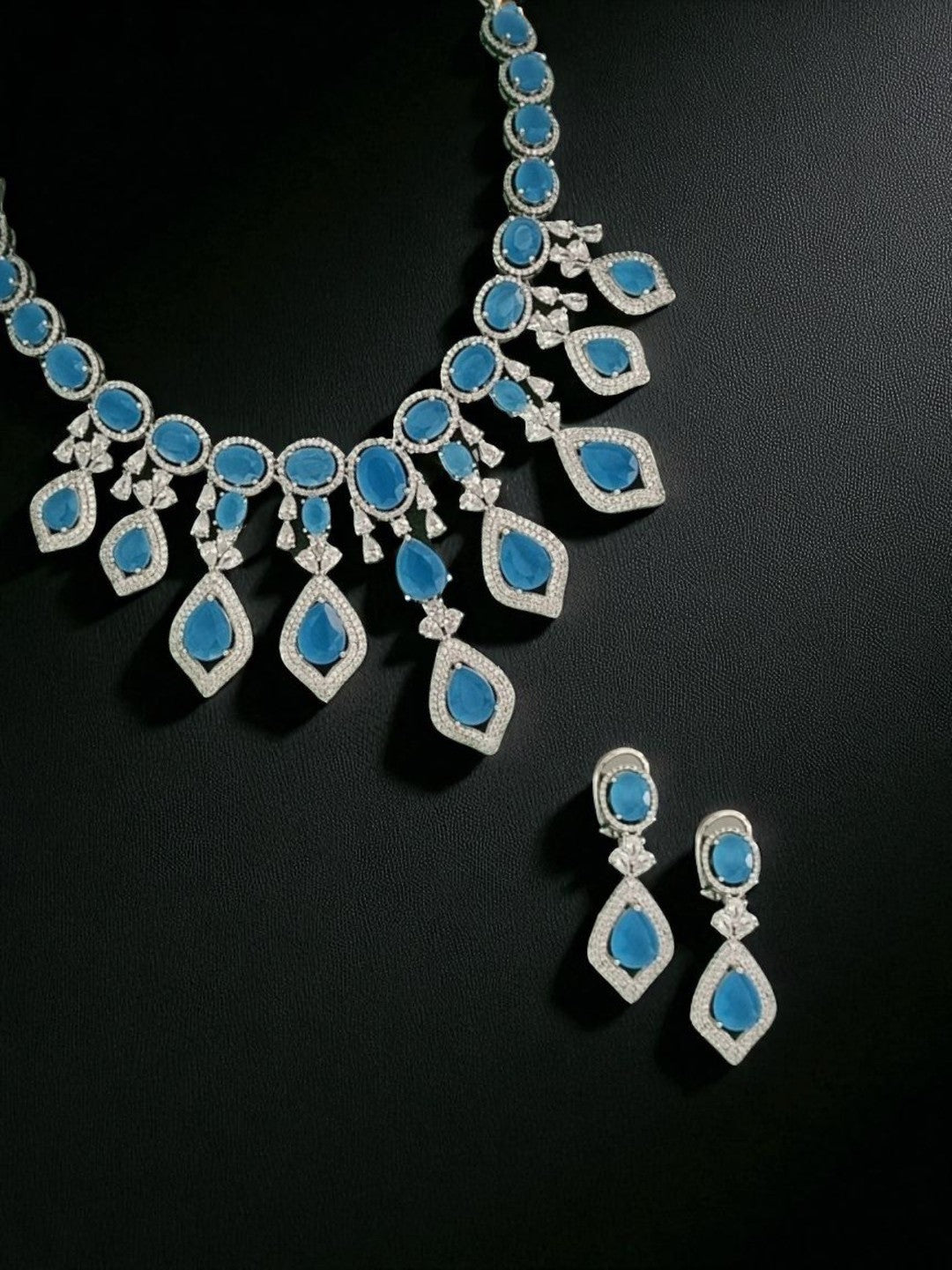 blue stone necklace set
statement jewellery for weddings
diamond finish necklace
house of pranvi jewellery
bridal blue necklace set
ocean blue jewellery set
party wear necklace for women
luxury necklace for occasions
designer necklace set
trendy necklace for receptions