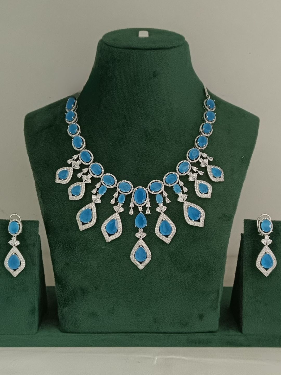 blue stone necklace set
statement jewellery for weddings
diamond finish necklace
house of pranvi jewellery
bridal blue necklace set
ocean blue jewellery set
party wear necklace for women
luxury necklace for occasions
designer necklace set
trendy necklace for receptions