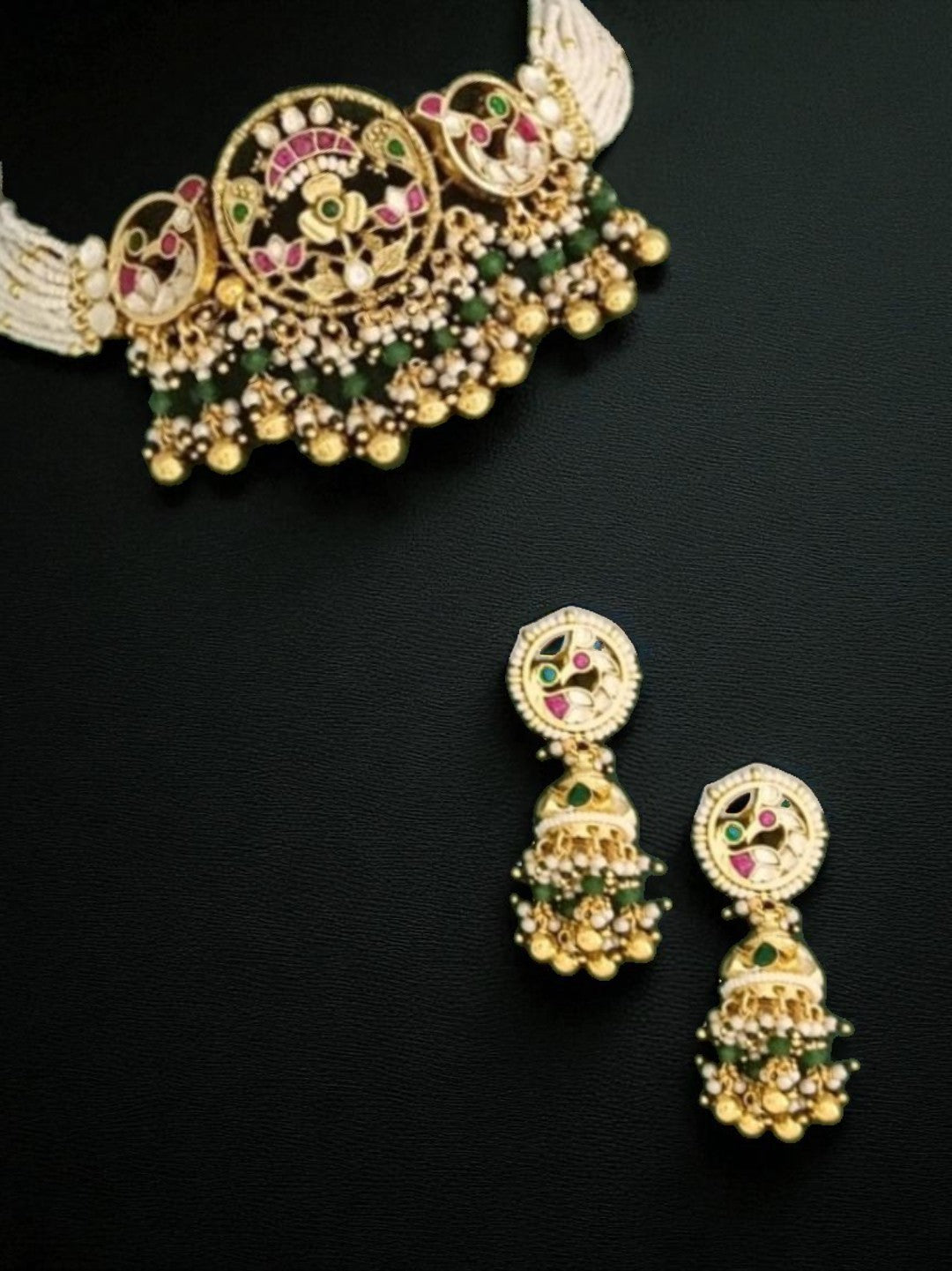 bridal jewellery, wedding choker, sangeet, traditional bride, festive, ethnic wear, celebration, pooja, occasion wear, navratri, diwali look, cultural jewellery, heritage, temple design, handcrafted, artisanal, antique finish, karigari, detailed work, timeless design, statement piece, choker set, jhumka earrings, fashion jewellery, ethnic fashion, layered necklace, bold look, luxury style, kundan, beads, gold polish, pearlwork, meena work, danglers, multi-strand choker, jadau inspired, modern traditional, i