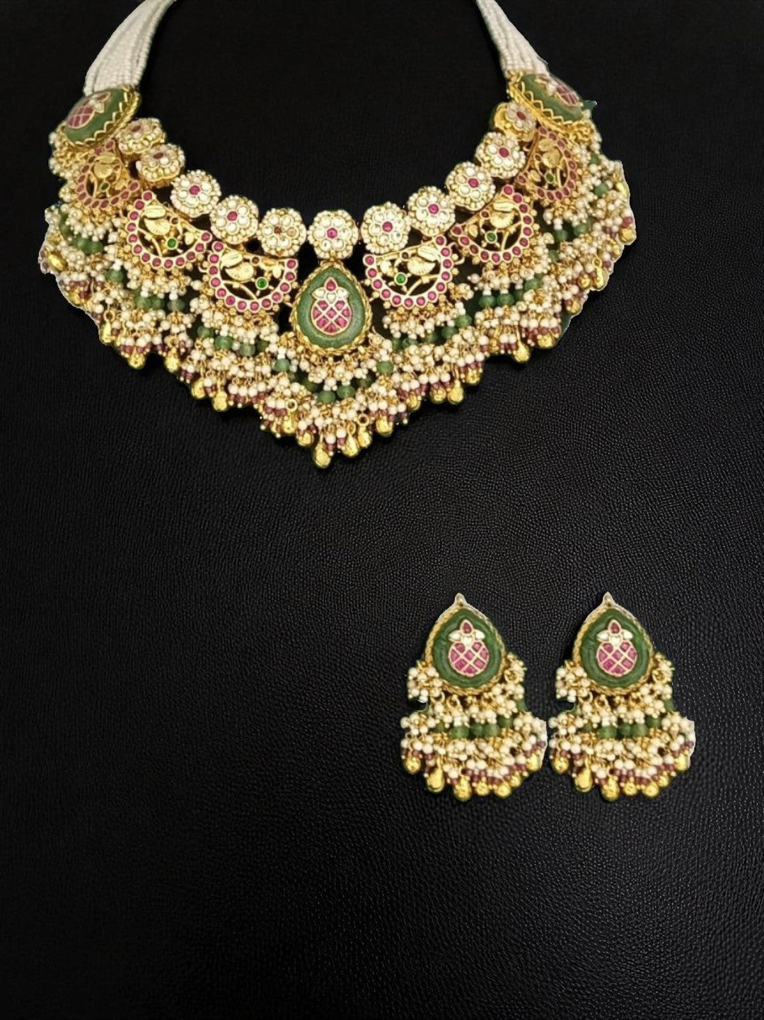 bridal jewellery, wedding choker, sangeet, traditional bride, festive, ethnic wear, celebration, pooja, occasion wear, navratri, diwali look, cultural jewellery, heritage, temple design, handcrafted, artisanal, antique finish, karigari, detailed work, timeless design, statement piece, choker set, jhumka earrings, fashion jewellery, ethnic fashion, layered necklace, bold look, luxury style, kundan, beads, gold polish, pearlwork, meena work, danglers, multi-strand choker, jadau inspired, modern traditional, i