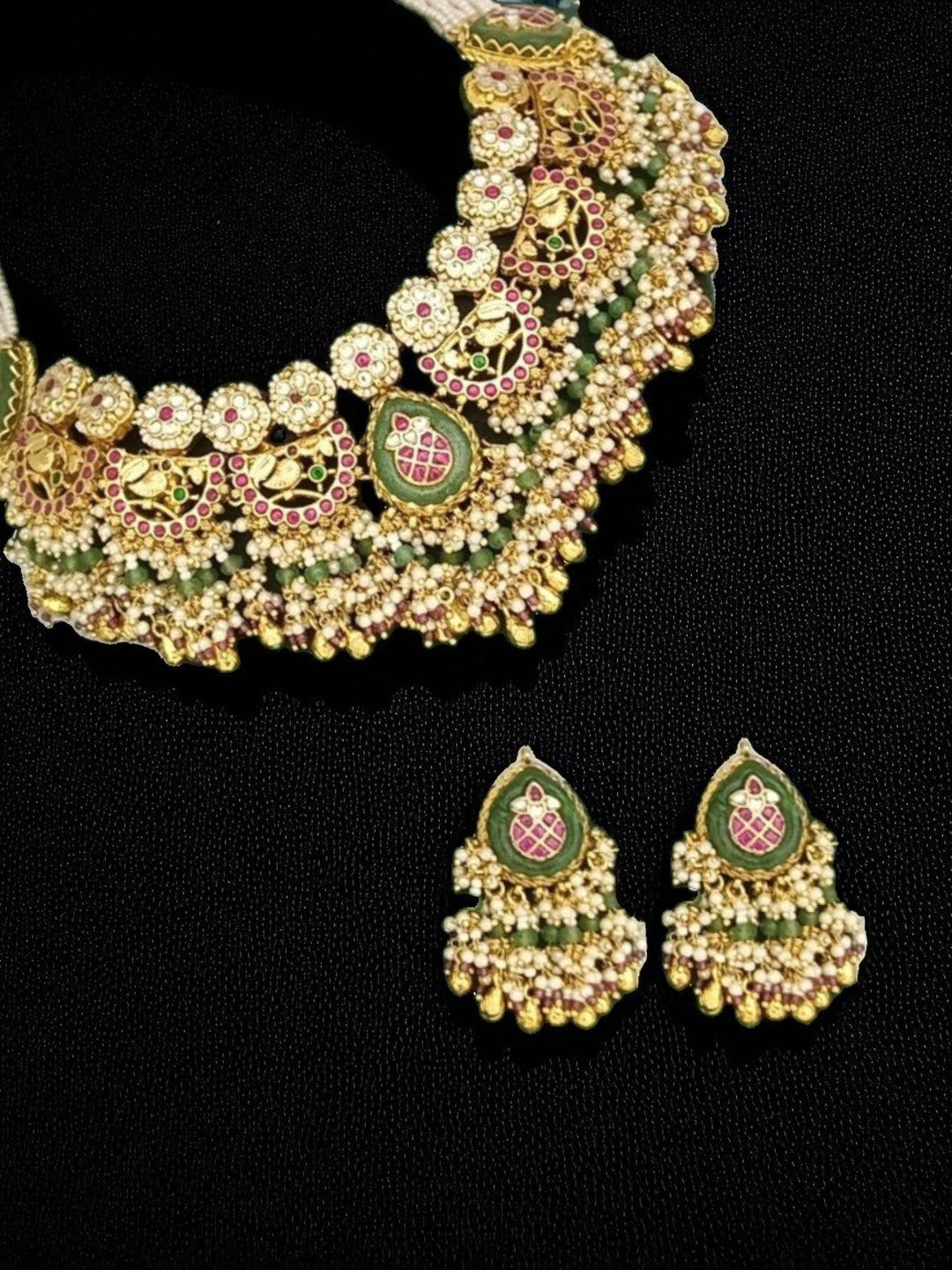 bridal jewellery, wedding choker, sangeet, traditional bride, festive, ethnic wear, celebration, pooja, occasion wear, navratri, diwali look, cultural jewellery, heritage, temple design, handcrafted, artisanal, antique finish, karigari, detailed work, timeless design, statement piece, choker set, jhumka earrings, fashion jewellery, ethnic fashion, layered necklace, bold look, luxury style, kundan, beads, gold polish, pearlwork, meena work, danglers, multi-strand choker, jadau inspired, modern traditional, i