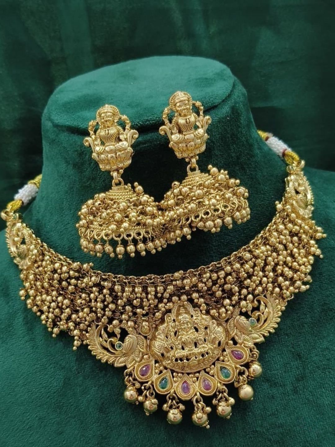 antique lakshmi necklace
temple jewellery necklace set
goddess lakshmi bridal jewellery
south indian gold tone necklace
traditional temple jewellery
handcrafted necklace for wedding
ethnic bridal necklace set
house of pranvi jewellery
lakshmi motif necklace set
festive jewellery for women