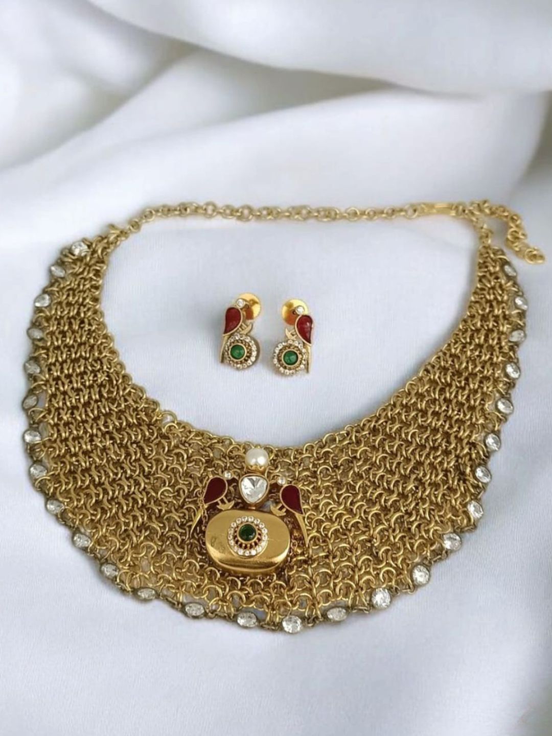 elegant, timeless, bridal jewellery, handcrafted design, pearl highlights, ethnic statement, luxe finish, celebration wear