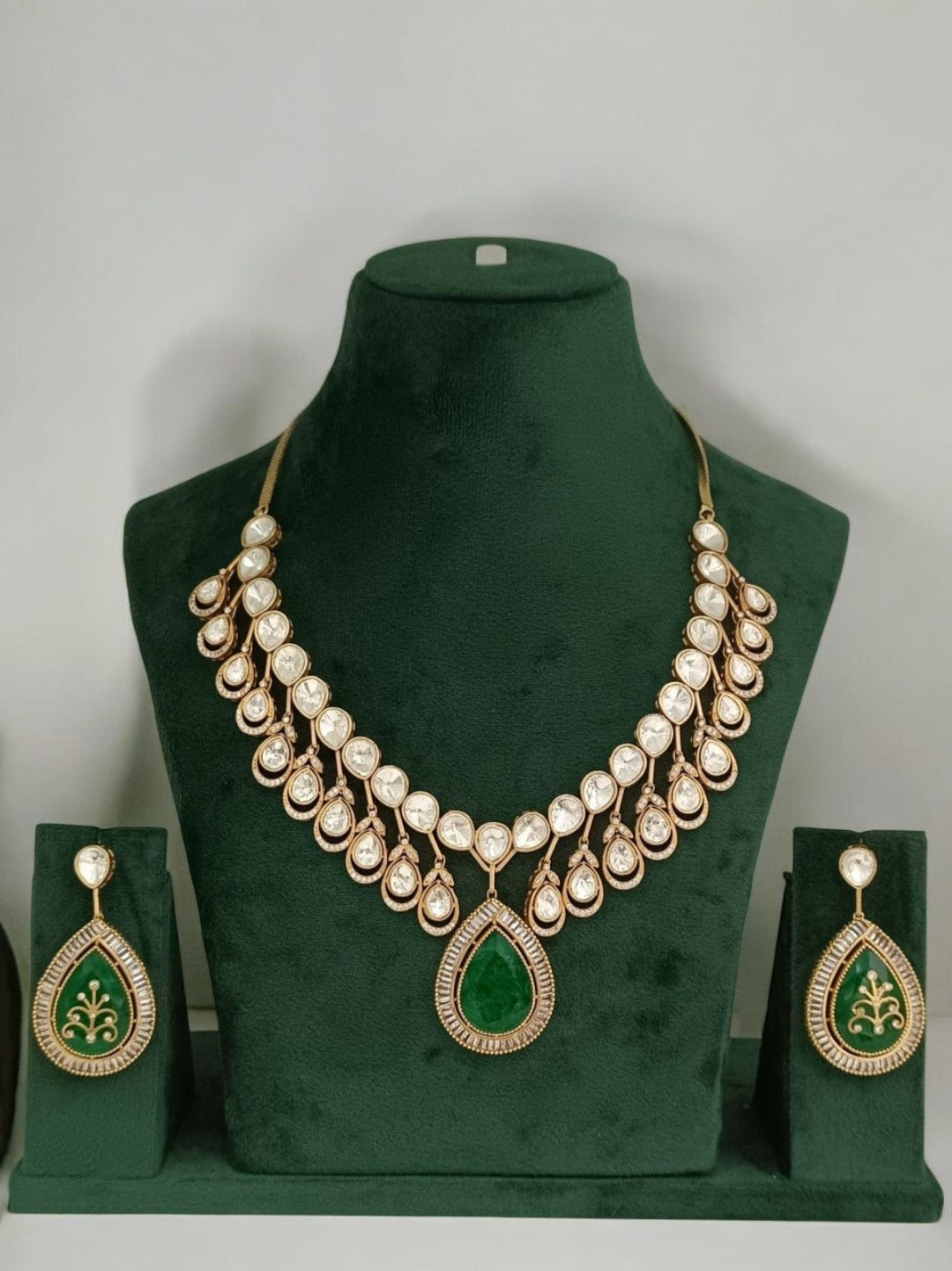 tear drop kundan necklace, emerald pendant jewellery, traditional bridal set, green and gold ethnic necklace, house of pranvi, kundan choker design, royal kundan set, wedding jewellery india, handcrafted necklace set, festive kundan accessories
