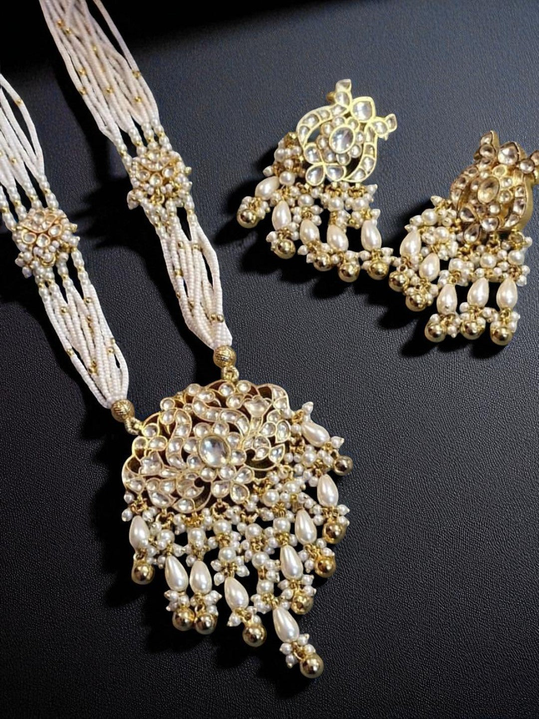 polki pearl jewellery, uncut stone necklace, classic bridal jewellery, ivory pearl set, traditional indian jewellery, handcrafted polki set, house of pranvi jewellery, festive wedding jewellery, kundan pearl jewellery, luxury ethnic necklace