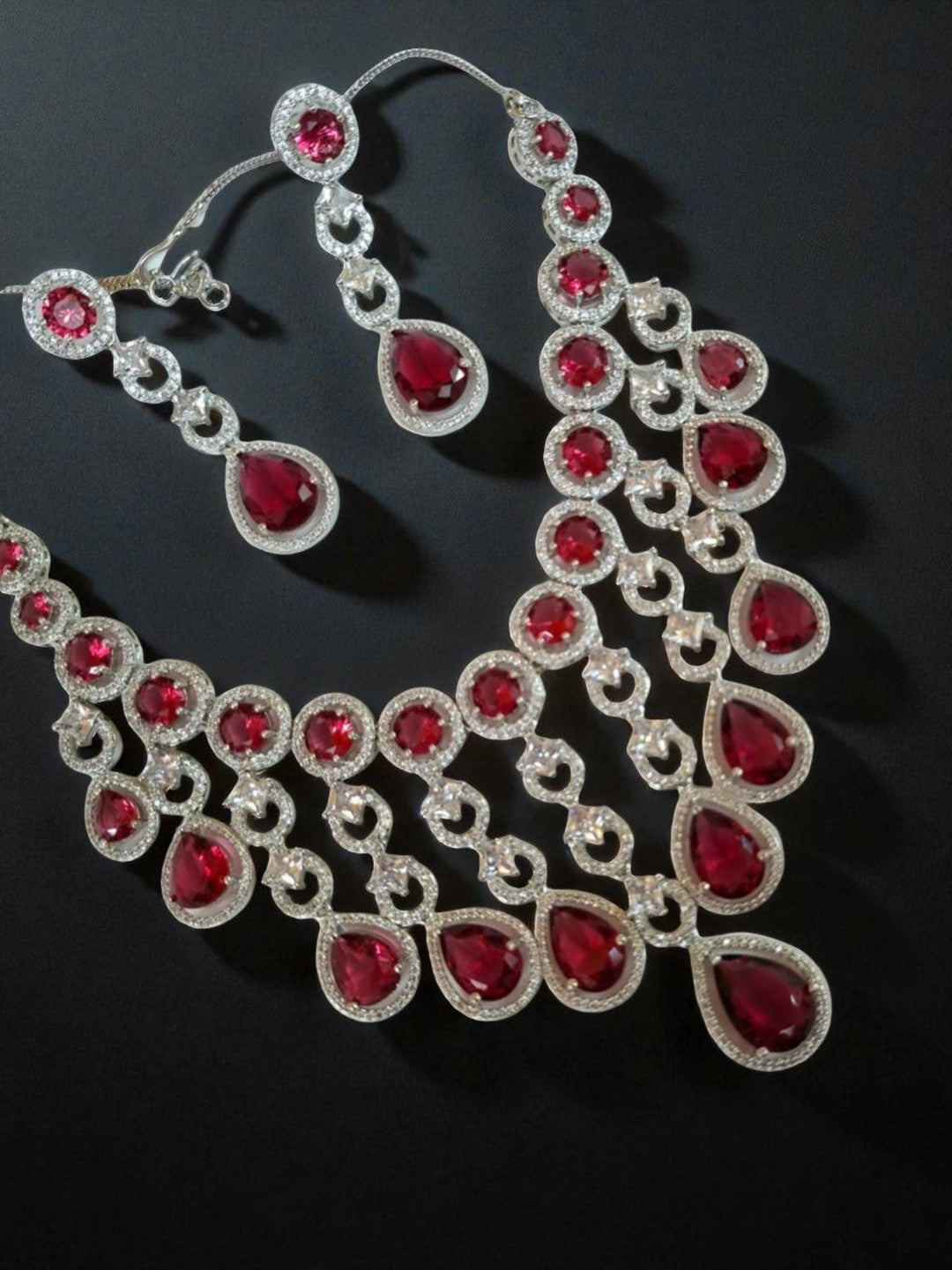 ruby necklace set, statement jewellery, bridal necklace, american diamond jewellery, red stone jewellery, house of pranvi, party wear jewellery, teardrop necklace, festive necklace set, engagement set, luxury indian jewellery, chandelier necklace, wedding guest jewellery, designer red jewellery