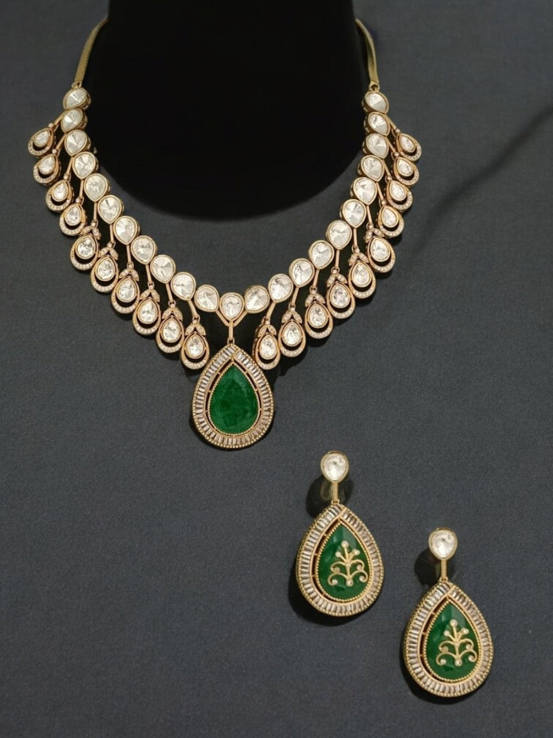 tear drop kundan necklace, emerald pendant jewellery, traditional bridal set, green and gold ethnic necklace, house of pranvi, kundan choker design, royal kundan set, wedding jewellery india, handcrafted necklace set, festive kundan accessories