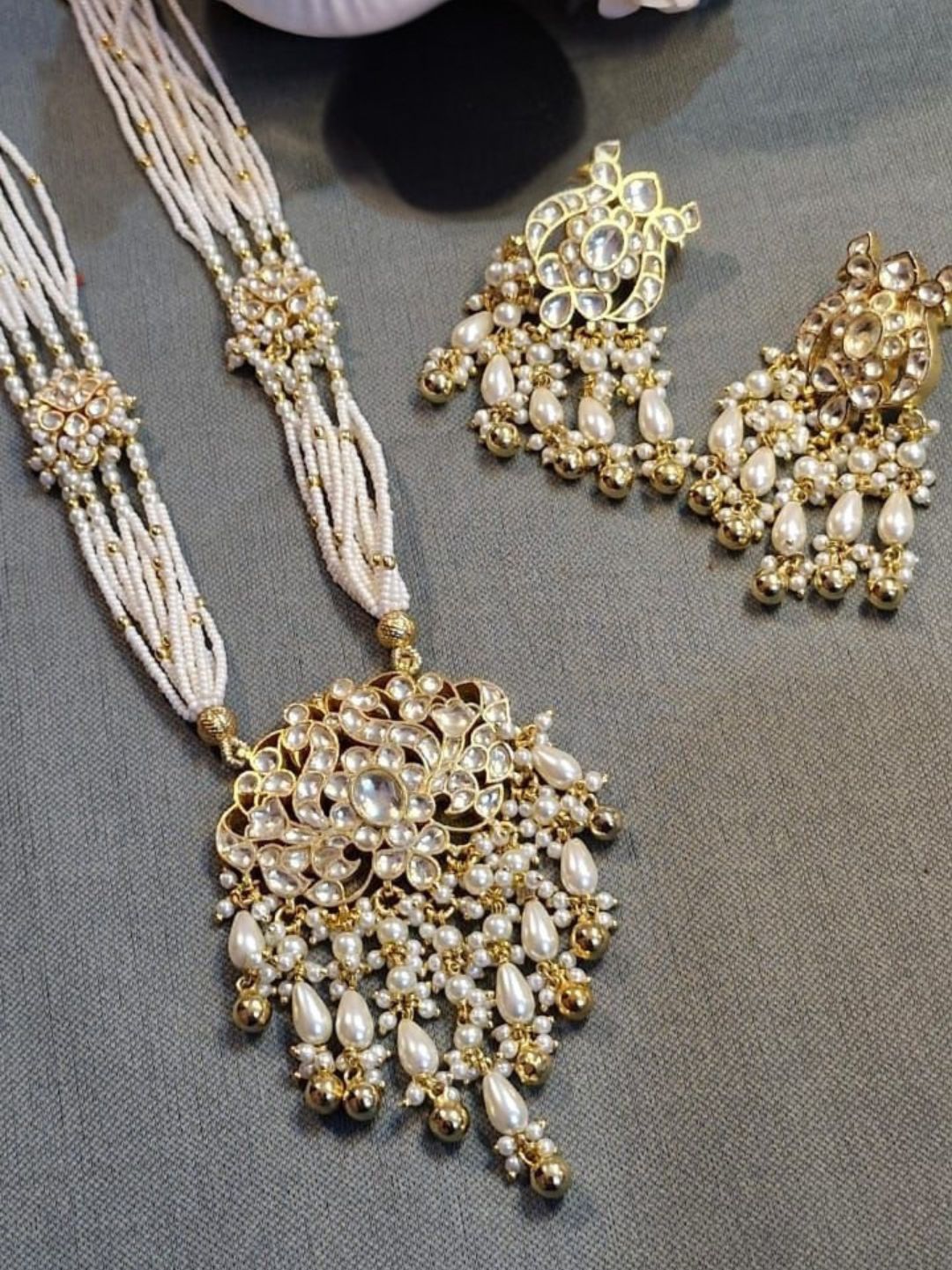 polki pearl jewellery, uncut stone necklace, classic bridal jewellery, ivory pearl set, traditional indian jewellery, handcrafted polki set, house of pranvi jewellery, festive wedding jewellery, kundan pearl jewellery, luxury ethnic necklace