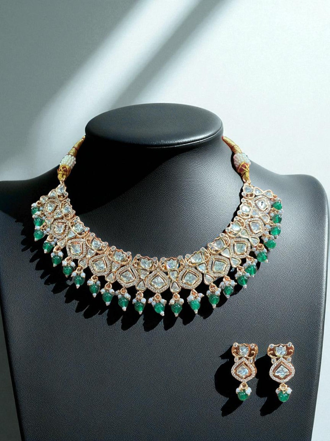 fusion festive jewellery, bold ethnic set, green gemstone choker, glam traditional look, wedding party necklace, trendy jewellery set, designer ethnic jewellery, kundan and beads, sangeet jewellery, house of pranvi glam
Let me know if y