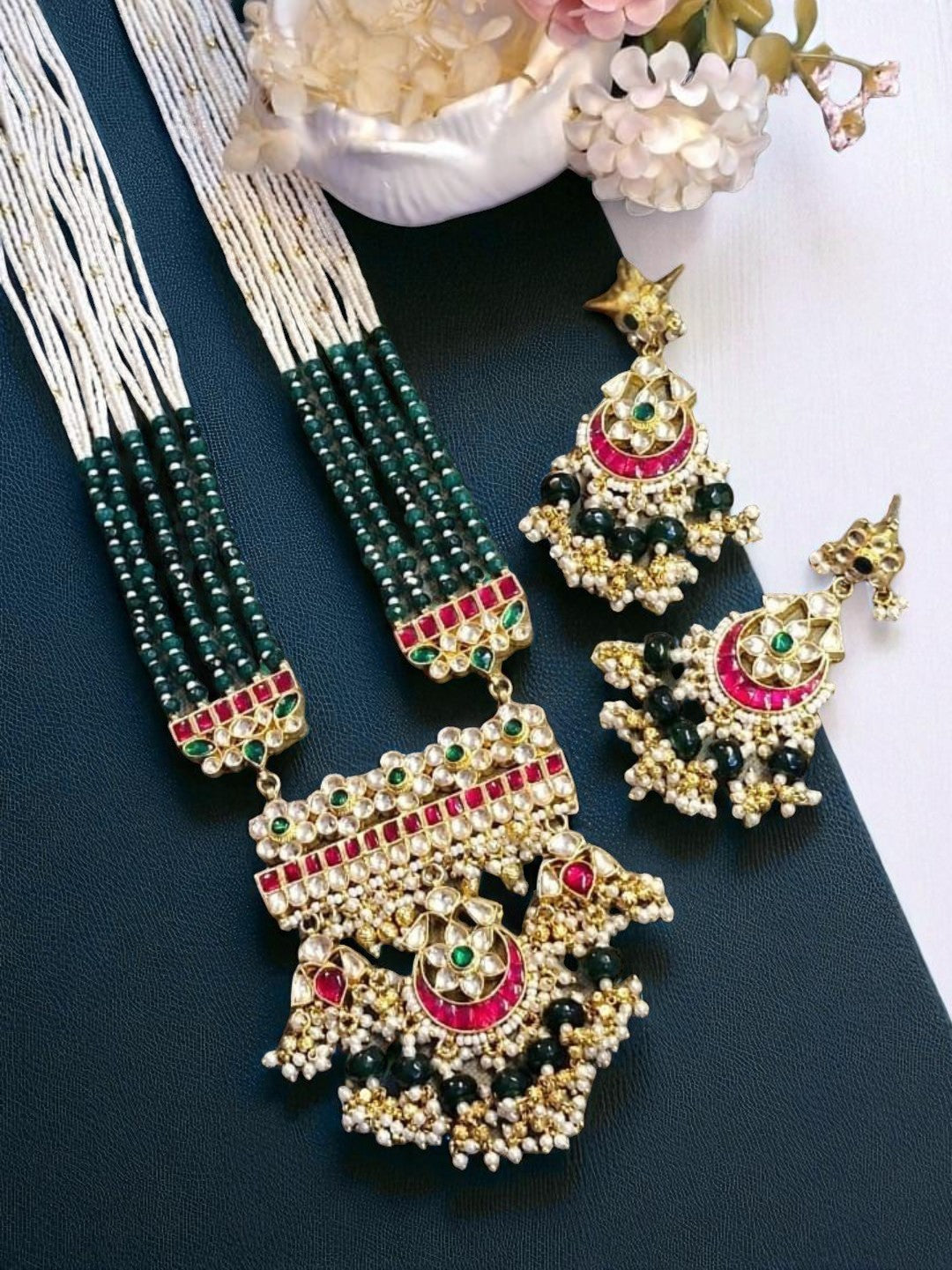 navratna jewellery set, ruby emerald necklace, multicolor kundan jewellery, green beaded necklace, bridal statement jewellery, traditional indian jewellery, house of pranvi collection, handcrafted ethnic set, festive wedding jewellery, bold kundan jewellery