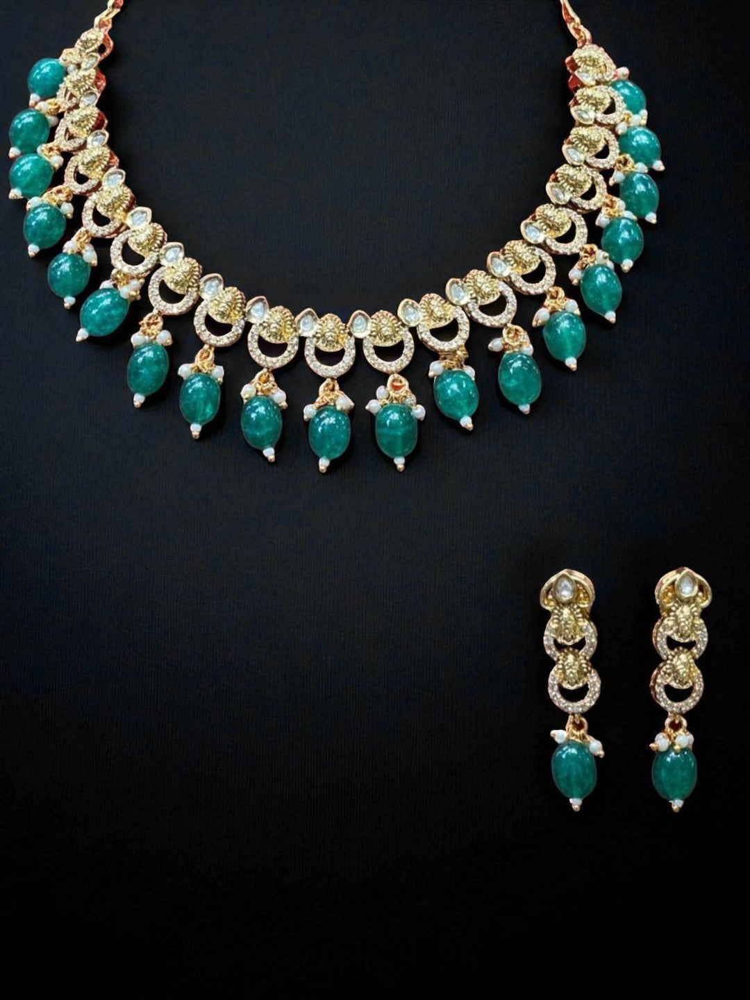 green stone choker, lightweight ethnic jewellery, nature inspired necklace, festive wear accessories, green drop earrings, minimal traditional jewellery, crescent motif necklace, luxury handcrafted set, heritage elegance