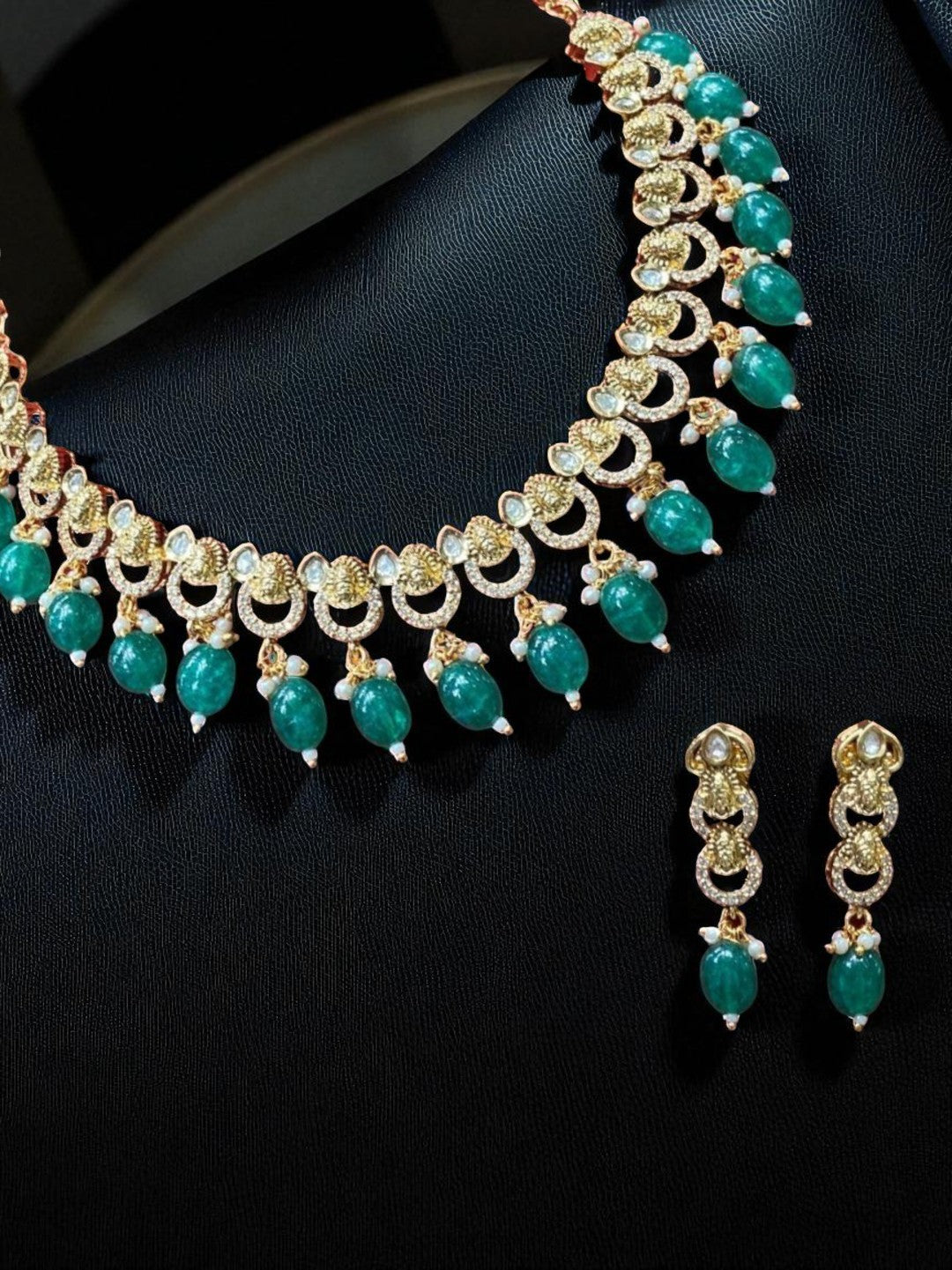 green stone choker, lightweight ethnic jewellery, nature inspired necklace, festive wear accessories, green drop earrings, minimal traditional jewellery, crescent motif necklace, luxury handcrafted set, heritage elegance