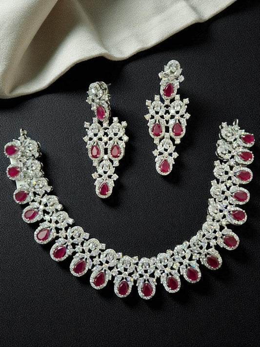 ruby necklace set, red stone jewellery, bridal jewellery, American diamond set, wedding choker set, traditional necklace, ethnic jewellery, diamond look jewellery, festive necklace and earrings, silver finish jewellery