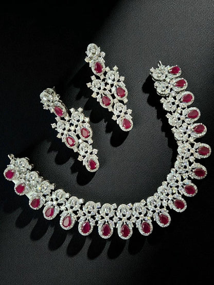 ruby necklace set, red stone jewellery, bridal jewellery, American diamond set, wedding choker set, traditional necklace, ethnic jewellery, diamond look jewellery, festive necklace and earrings, silver finish jewellery