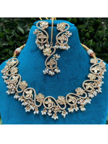 kundan floral set, light ethnic jewellery, pearl kundan necklace, festive wear jewellery, swirl design necklace, delicate kundan choker, indian bridesmaid jewellery, pastel ethnic set