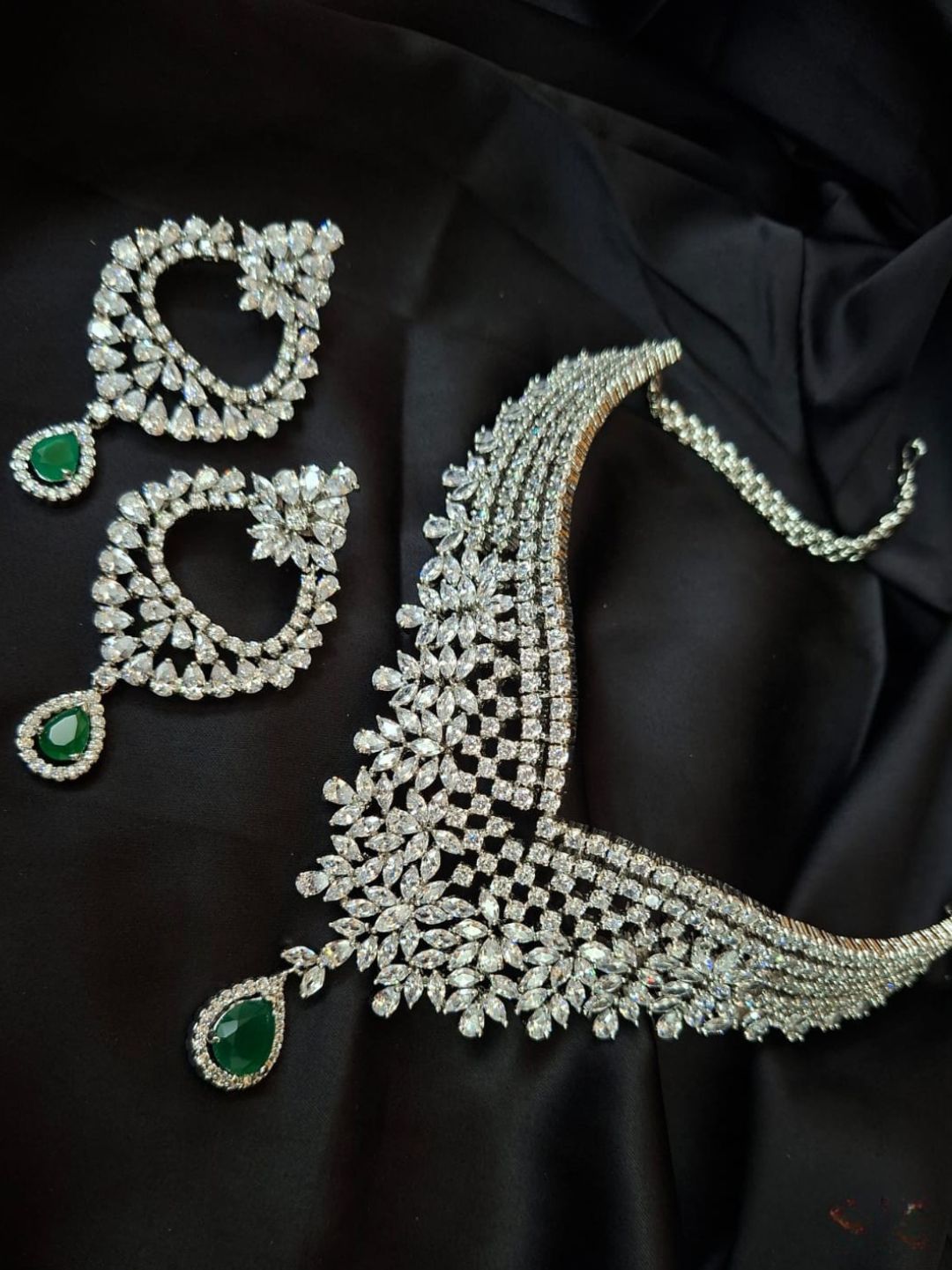 diamond look jewellery, emerald accent set, cocktail necklace set, statement bridal jewellery, crystal choker with green drop, luxury fashion jewellery, indian reception jewellery, V-cut necklace set, designer wedding set, sparkling kundan necklace