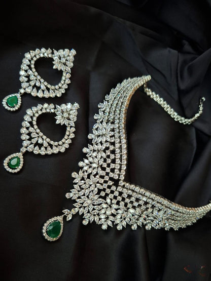 diamond look jewellery, emerald accent set, cocktail necklace set, statement bridal jewellery, crystal choker with green drop, luxury fashion jewellery, indian reception jewellery, V-cut necklace set, designer wedding set, sparkling kundan necklace