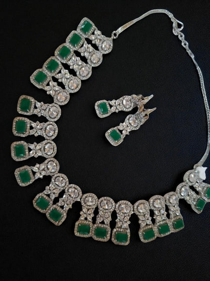 green stone jewellery, emerald necklace set, square cut necklace, traditional jewellery, bridal necklace set, American diamond jewellery, silver finish necklace, ethnic jewellery set, wedding jewellery, designer necklace and earrings