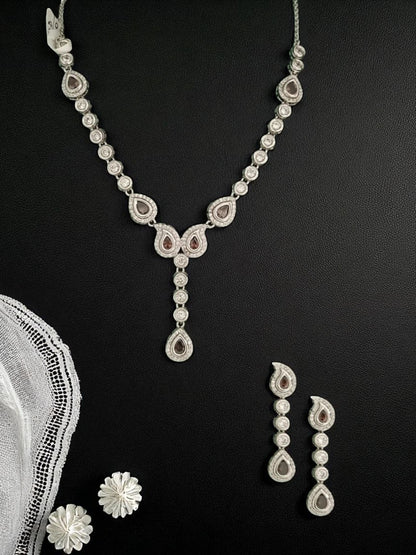 diamond finish necklace
party wear necklace set
silver necklace for women
teardrop diamond necklace
elegant jewellery for weddings
luxury necklace set for women
house of pranvi jewellery
minimalist diamond necklace
statement necklace for parties
bridal necklace set