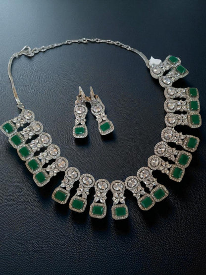 green stone jewellery, emerald necklace set, square cut necklace, traditional jewellery, bridal necklace set, American diamond jewellery, silver finish necklace, ethnic jewellery set, wedding jewellery, designer necklace and earrings