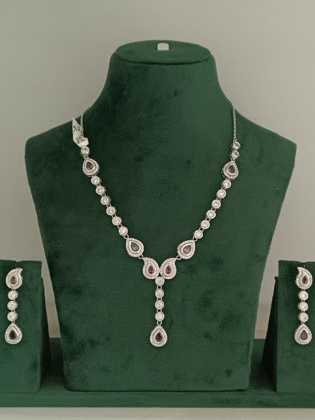 diamond finish necklace
party wear necklace set
silver necklace for women
teardrop diamond necklace
elegant jewellery for weddings
luxury necklace set for women
house of pranvi jewellery
minimalist diamond necklace
statement necklace for parties
bridal necklace set