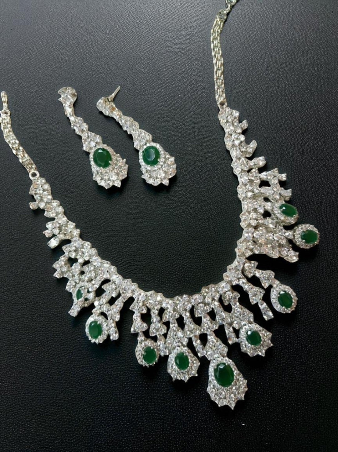 green stone necklace, emerald jewellery set, bridal choker set, diamond look jewellery, silver polish necklace, ethnic jewellery set, wedding jewellery, statement necklace, festive wear jewellery, American diamond set