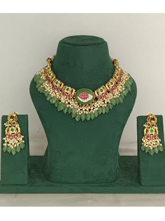 green drop necklace, lotus motif jewellery, kundan choker set, traditional necklace, pearl bead necklace, festive jewellery, Indian ethnic jewellery, bridal choker set, ruby emerald necklace, temple inspired jewellery