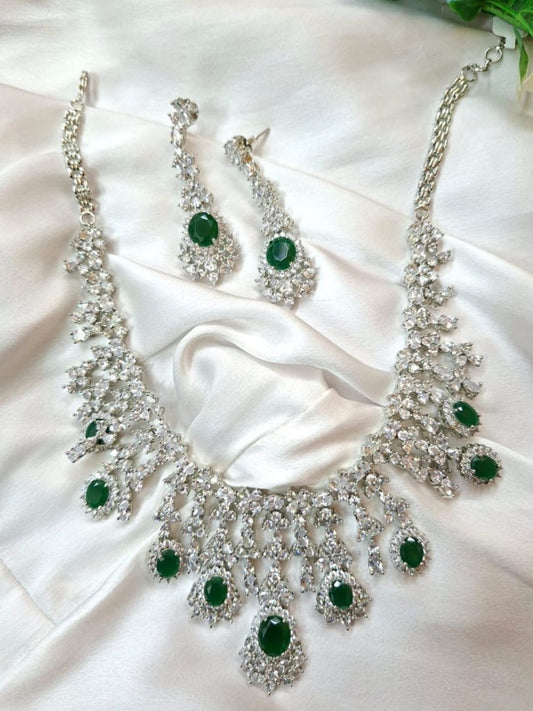 green stone necklace, emerald jewellery set, bridal choker set, diamond look jewellery, silver polish necklace, ethnic jewellery set, wedding jewellery, statement necklace, festive wear jewellery, American diamond set