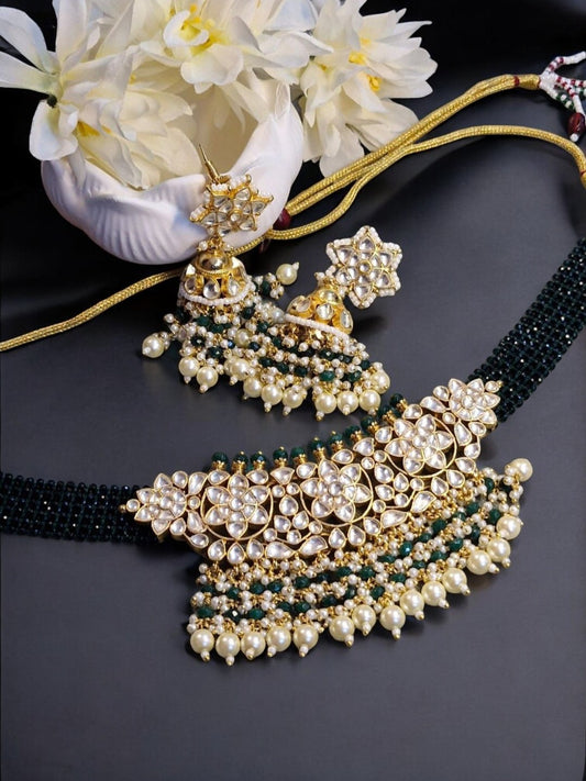 #HouseOfPranvi #KundanChokerSet #PearlJewellery #GreenBeadChoker #FloralKundanDesign #HandcraftedElegance #TraditionalJewellery #WeddingJewellerySet #RoyalIndianJewels #ElegantJhumkaSet #LuxuryEthnicStyle #HaldiLookJewellery #BridalChokerSet #StatementNeckpieceIndia #HeritageInspiredJewels


