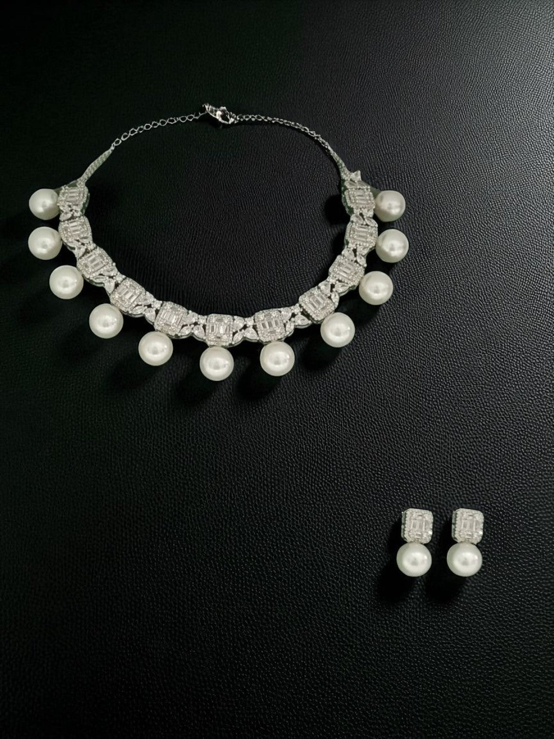statement pearl necklace, luxury pearl jewellary, bridal diamond look set, white drop pearl necklace, evening jewellary, festive wear accessories, House of Pranvi jewellary, pearl and stone necklace, regal jewellary design, diamond textured choke