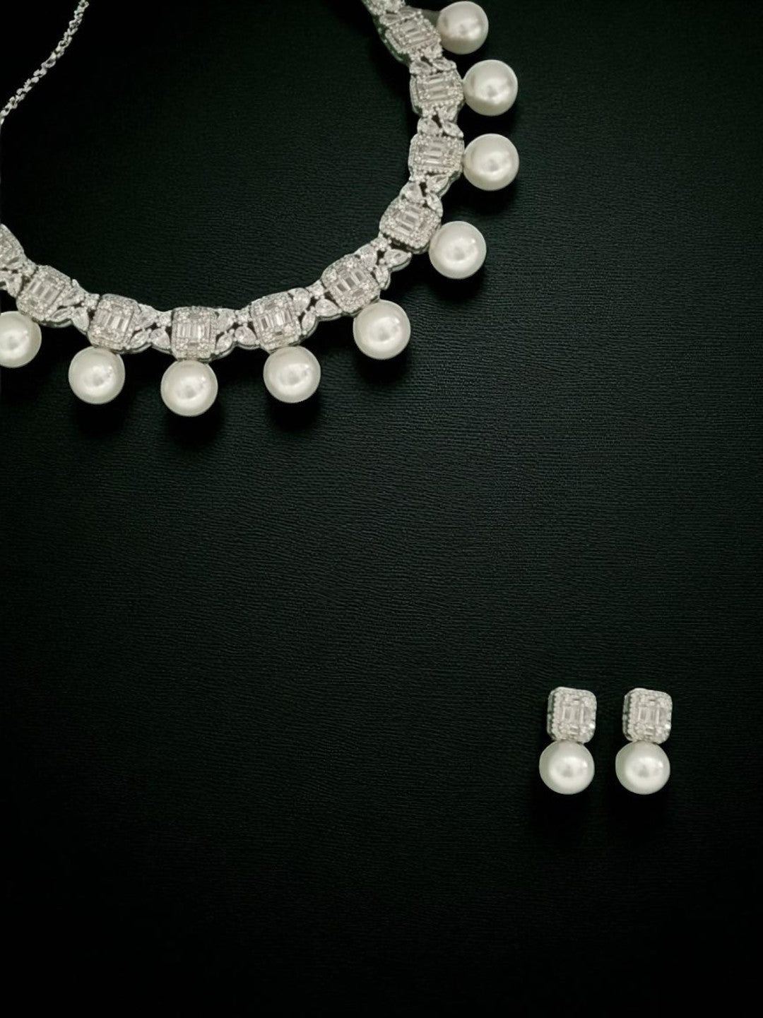 statement pearl necklace, luxury pearl jewellary, bridal diamond look set, white drop pearl necklace, evening jewellary, festive wear accessories, House of Pranvi jewellary, pearl and stone necklace, regal jewellary design, diamond textured choke