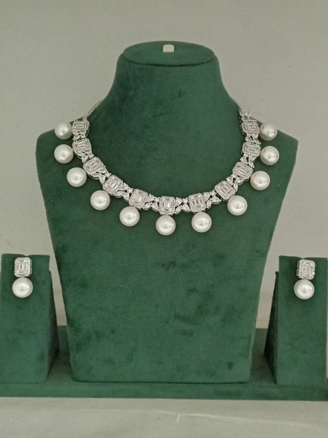 statement pearl necklace, luxury pearl jewellary, bridal diamond look set, white drop pearl necklace, evening jewellary, festive wear accessories, House of Pranvi jewellary, pearl and stone necklace, regal jewellary design, diamond textured choke