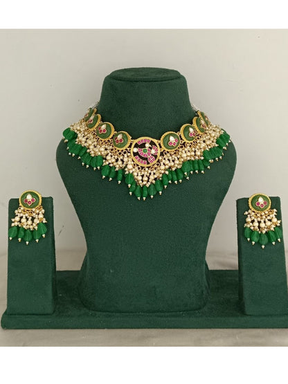 bridal jewellery, wedding choker, sangeet, traditional bride, festive, ethnic wear, celebration, pooja, occasion wear, navratri, diwali look, cultural jewellery, heritage, temple design, handcrafted, artisanal, antique finish, karigari, detailed work, timeless design, statement piece, choker set, jhumka earrings, fashion jewellery, ethnic fashion, layered necklace, bold look, luxury style, kundan, beads, gold polish, pearlwork, meena work, danglers, multi-strand choker, jadau inspired, modern traditional, i
