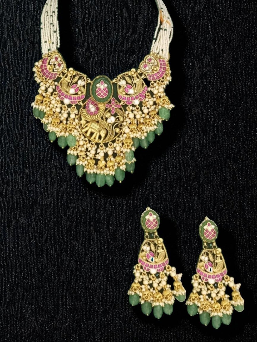 bridal jewellery, wedding choker, sangeet, traditional bride, festive, ethnic wear, celebration, pooja, occasion wear, navratri, diwali look, cultural jewellery, heritage, temple design, handcrafted, artisanal, antique finish, karigari, detailed work, timeless design, statement piece, choker set, jhumka earrings, fashion jewellery, ethnic fashion, layered necklace, bold look, luxury style, kundan, beads, gold polish, pearlwork, meena work, danglers, multi-strand choker, jadau inspired, modern traditional, i
