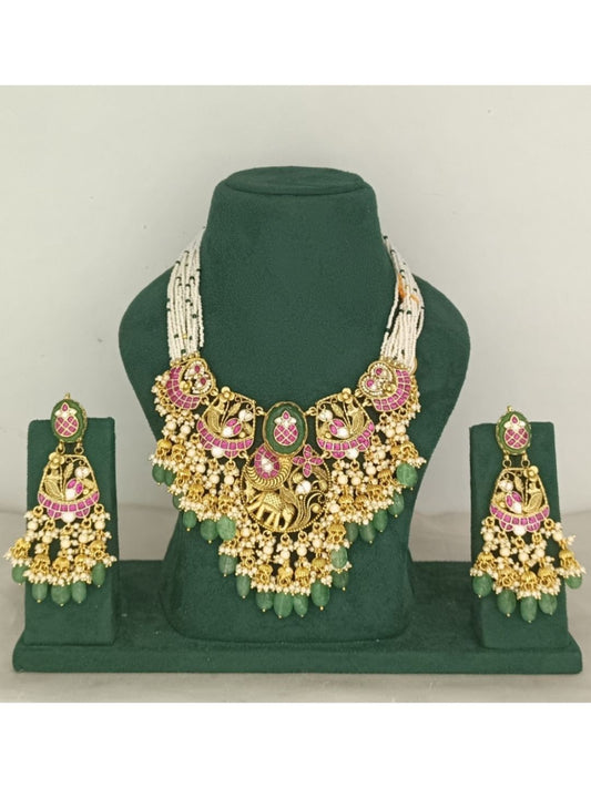 bridal jewellery, wedding choker, sangeet, traditional bride, festive, ethnic wear, celebration, pooja, occasion wear, navratri, diwali look, cultural jewellery, heritage, temple design, handcrafted, artisanal, antique finish, karigari, detailed work, timeless design, statement piece, choker set, jhumka earrings, fashion jewellery, ethnic fashion, layered necklace, bold look, luxury style, kundan, beads, gold polish, pearlwork, meena work, danglers, multi-strand choker, jadau inspired, modern traditional, i