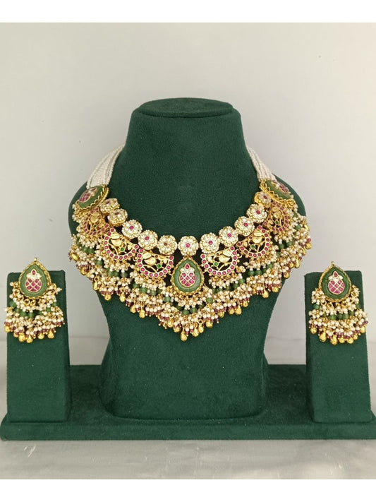 bridal jewellery, wedding choker, sangeet, traditional bride, festive, ethnic wear, celebration, pooja, occasion wear, navratri, diwali look, cultural jewellery, heritage, temple design, handcrafted, artisanal, antique finish, karigari, detailed work, timeless design, statement piece, choker set, jhumka earrings, fashion jewellery, ethnic fashion, layered necklace, bold look, luxury style, kundan, beads, gold polish, pearlwork, meena work, danglers, multi-strand choker, jadau inspired, modern traditional, i