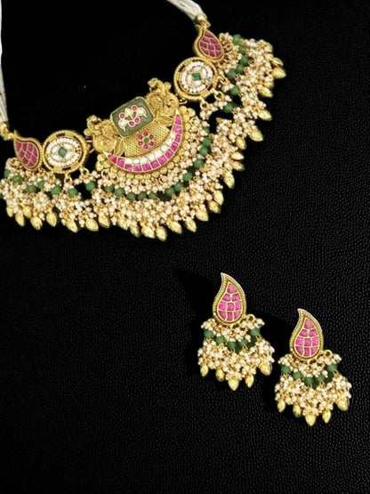 bridal jewellery, wedding choker, sangeet, traditional bride, festive, ethnic wear, celebration, pooja, occasion wear, navratri, diwali look, cultural jewellery, heritage, temple design, handcrafted, artisanal, antique finish, karigari, detailed work, timeless design, statement piece, choker set, jhumka earrings, fashion jewellery, ethnic fashion, layered necklace, bold look, luxury style, kundan, beads, gold polish, pearlwork, meena work, danglers, multi-strand choker, jadau inspired, modern traditional, 