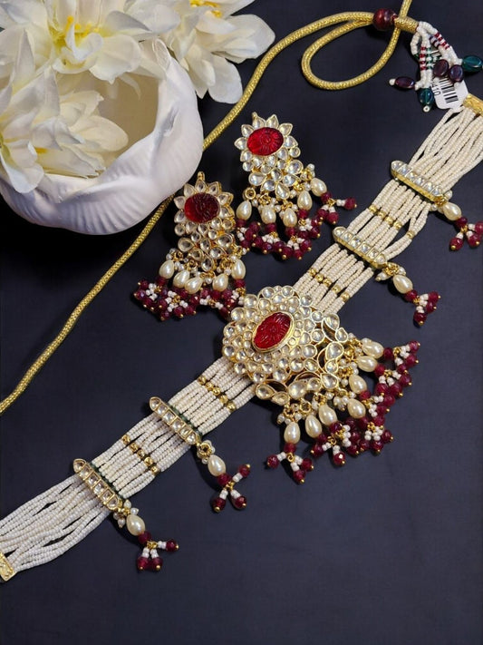 #RoyalChokerSet #RubyKundanJewellery #HouseOfPranvi #CarvedStoneJewellery #LuxuryBridalJewellery #PearlKundanSet #EthnicChokerDesign #IndianWeddingJewellery #HandcraftedChokerSet #MaroonGoldJewellery

