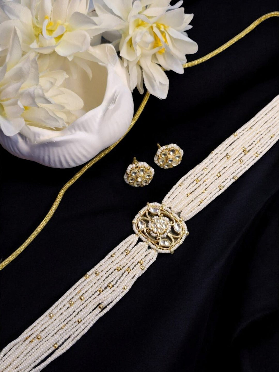 #KundanPearlChoker #IvoryJewellery #MinimalBridalJewellery #HouseOfPranvi #PearlChokerSet #EtherealIndianJewellery #LuxuryEthnicJewellery #WeddingChoker #HandcraftedJewellery #KundanNecklaceSet

