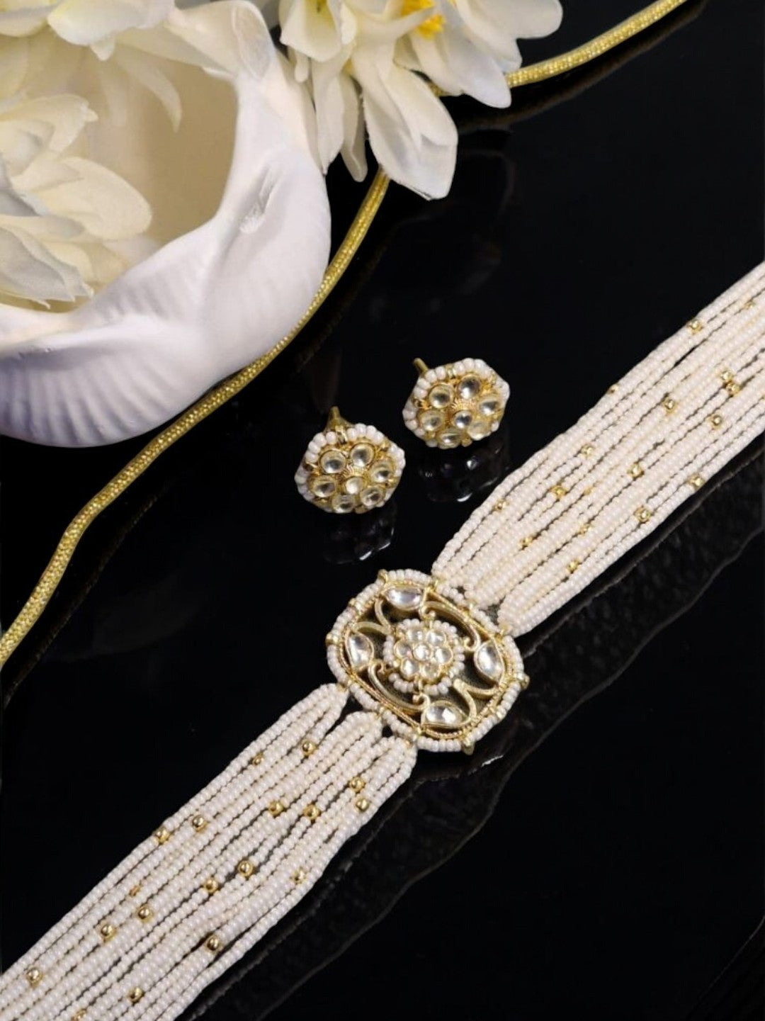 #KundanPearlChoker #IvoryJewellery #MinimalBridalJewellery #HouseOfPranvi #PearlChokerSet #EtherealIndianJewellery #LuxuryEthnicJewellery #WeddingChoker #HandcraftedJewellery #KundanNecklaceSet

