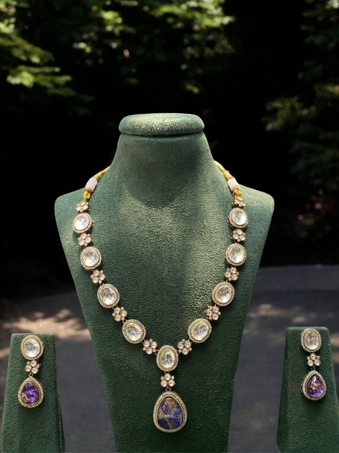 amethyst kundan necklace, violet stone necklace set, floral kundan jewelry, heritage kundan collection, indian wedding jewelry, house of pranvi designer set, kundan pendant necklace, handcrafted bridal set, traditional stone drop earrings, luxury indian fashion jewelry, gemstone kundan necklace, statement ethnic necklace, sangeet jewelry set, violet kundan drop earrings