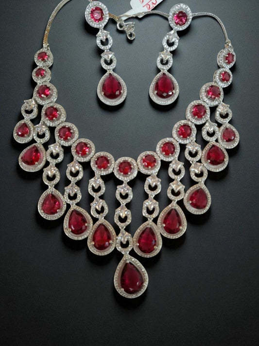 ruby necklace set, statement jewellery, bridal necklace, american diamond jewellery, red stone jewellery, house of pranvi, party wear jewellery, teardrop necklace, festive necklace set, engagement set, luxury indian jewellery, chandelier necklace, wedding guest jewellery, designer red jewellery