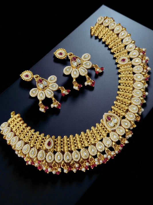 gulab rani jewellary, ruby pearl kundan, bridal set with rubies, gold tone traditional jewellary, handcrafted ethnic jewellery, polki kundan necklace, indian occasion wear