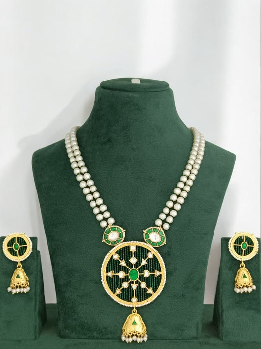 heritage kundan jewelry, pearl and green necklace set, jhumka earring necklace set, traditional chakra pendant set, enamel kundan jewelry, ethnic indian statement necklace, modern heirloom set, green and gold necklace, festive kundan jewelry, bridal mehendi jewelry, mandala inspired necklace, regal indian jewelry design